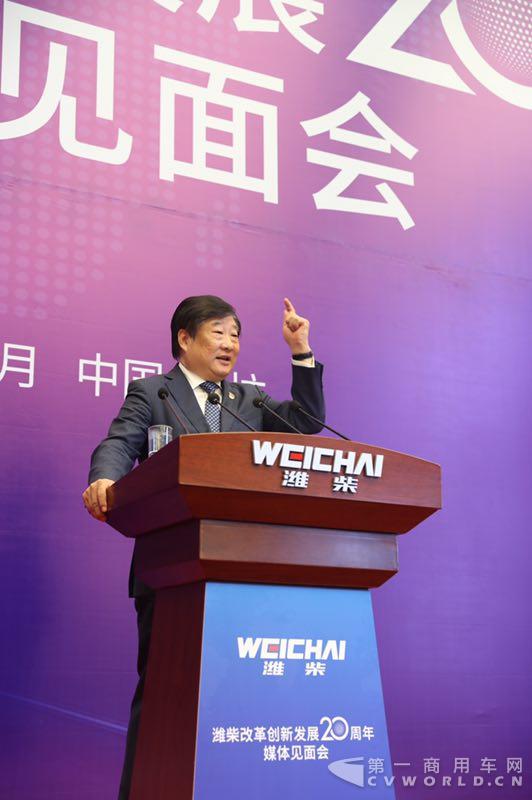 谭旭光答记者问.jpg 谭旭光答记者问.jpg